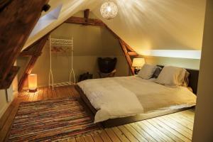 Appartements Au P-tit Bouchon - free parking - duplex : photos des chambres