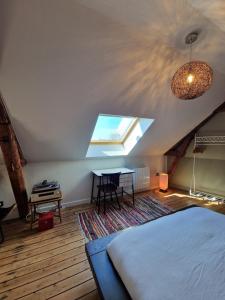 Appartements Au P-tit Bouchon - free parking - duplex : photos des chambres