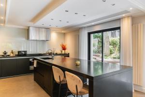 Appartements L-Ecrin Wagram - Proche des Champs Elysees : photos des chambres