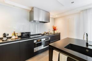 Appartements L-Ecrin Wagram - Proche des Champs Elysees : photos des chambres