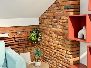 Appartements Studio place du Capitole climatisation : photos des chambres