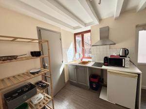 Appartements Charmant T2 au coeur de la ville : photos des chambres