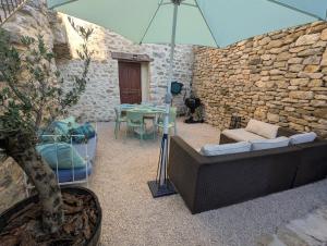 Appartements Entre cuves et sources - au coeur de Goudargues : photos des chambres