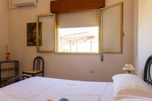 Torre suda vista mare di Paf