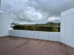 Green Coast Apartments