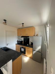 Maisons de vacances Maison cosy a 10 minutes de la plage : photos des chambres