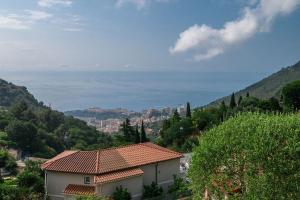 Maisons de vacances VILLA COLLINA - Vue sur la Mer - Jardin - Parking : photos des chambres