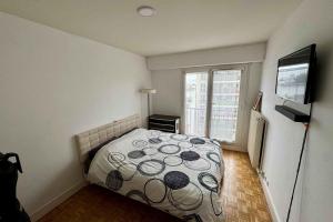 Appartements Pleasant 2P with balcony & Eiffel Tower view : photos des chambres
