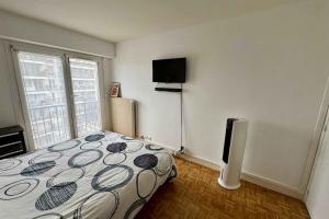 Appartements Pleasant 2P with balcony & Eiffel Tower view : photos des chambres