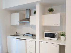 ROSSO MAGENTA - Luminoso loft in centro e a due passi dalla stazione