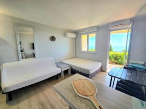 Studio 4pers - clim - piscine - vue mer