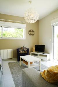 Maisons de vacances Charmante maison familiale avec jardin et barbecue : photos des chambres