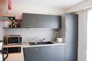 Maisons de vacances Charmante maison familiale avec jardin et barbecue : photos des chambres