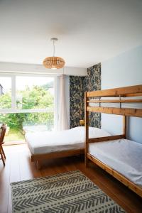 Maisons de vacances Charmante maison familiale avec jardin et barbecue : photos des chambres