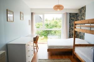 Maisons de vacances Charmante maison familiale avec jardin et barbecue : photos des chambres