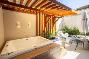 Way Bossa #J - Térreo com Jacuzzi por Carpediem