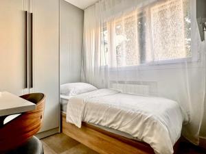 Appartements Studio Renove au style epure : photos des chambres