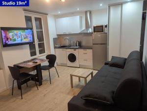 Appartements Le Jardin en centre ville - ANCV accepte : photos des chambres
