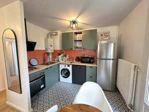 Appartements Confort et Verdure 2 Pieces Moderne avec Parking a Domont by Immo Kit Bnb : photos des chambres