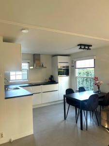 Bosparel met ruime tuin en airco!