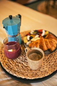 Appartements Desert rose jacuzzi situe a 5 min du centre ville de mulhouse stationnement privee sur demande : photos des chambres