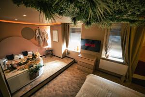 Appartements Desert rose jacuzzi situe a 5 min du centre ville de mulhouse stationnement privee sur demande : photos des chambres