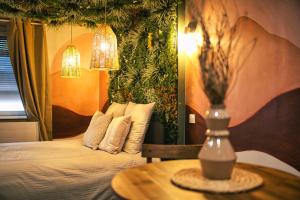 Appartements Desert rose jacuzzi situe a 5 min du centre ville de mulhouse stationnement privee sur demande : photos des chambres