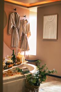 Appartements Desert rose jacuzzi situe a 5 min du centre ville de mulhouse stationnement privee sur demande : photos des chambres