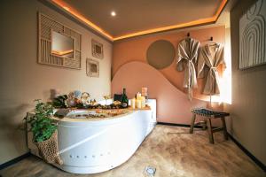 Appartements Desert rose jacuzzi situe a 5 min du centre ville de mulhouse stationnement privee sur demande : photos des chambres