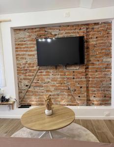 Appartements Escapade Tournefeuille, jacuzzi, balneo, terrasse : photos des chambres