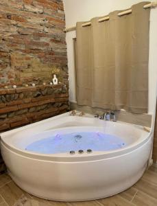 Appartements Escapade Tournefeuille, jacuzzi, balneo, terrasse : photos des chambres