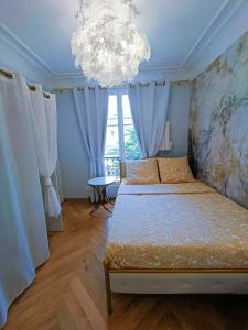 Appartements Au Petit Trianon Bleu : photos des chambres