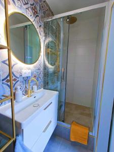 Appartements Au Petit Trianon Bleu : photos des chambres