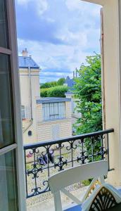 Appartements Au Petit Trianon Bleu : photos des chambres