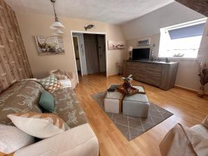 Appartements Petit coin de Paradis : photos des chambres