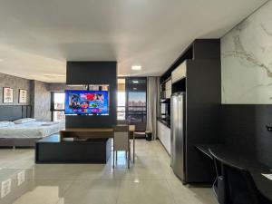 Estúdio Alto e Aconchegante no 18º andar