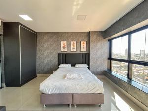 Estúdio Alto e Aconchegante no 18º andar