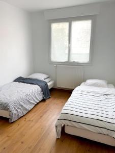 Maisons d'hotes Le Voyage Paris - Appartement partage : photos des chambres