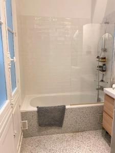 Maisons d'hotes Le Voyage Paris - Appartement partage : photos des chambres