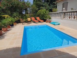 Villas Charmante villa : photos des chambres
