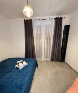 Appartements Le Velodrome - la suite avec Clim et parking : photos des chambres
