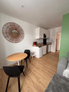 Appartements Logements centre Bourg : photos des chambres
