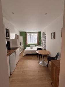 Appartements Logements centre Bourg : photos des chambres