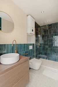 Appartements Suite Emeraude : photos des chambres