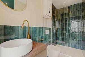 Appartements Suite Emeraude : photos des chambres