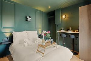 Appartements Suite Emeraude : photos des chambres