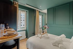 Appartements Suite Emeraude : photos des chambres