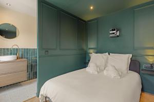 Appartements Suite Emeraude : photos des chambres