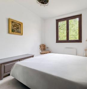 Maisons de vacances Maison Charmante avec Piscine et Jardin partage : photos des chambres