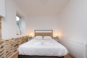 Appartements Le Duplex entre terre et mer : photos des chambres
